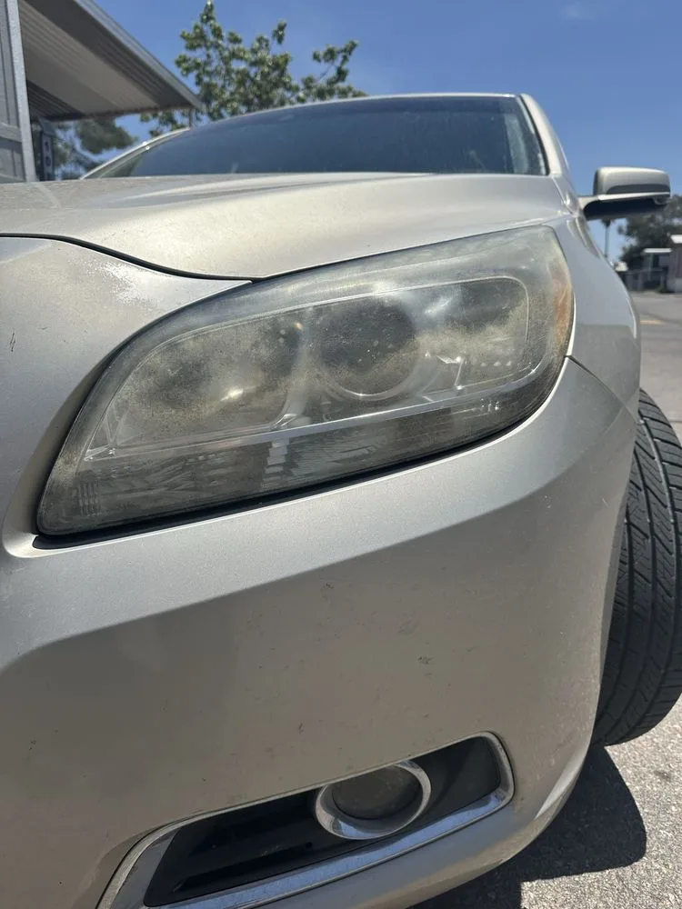 Cloudy headlight before Cano Auto Care restoration